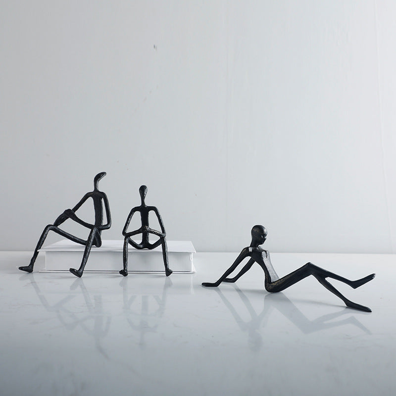 Künstlerische sitzende Figuren Skulptur