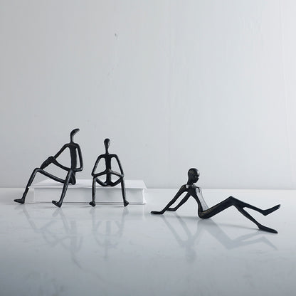 Künstlerische sitzende Figuren Skulptur