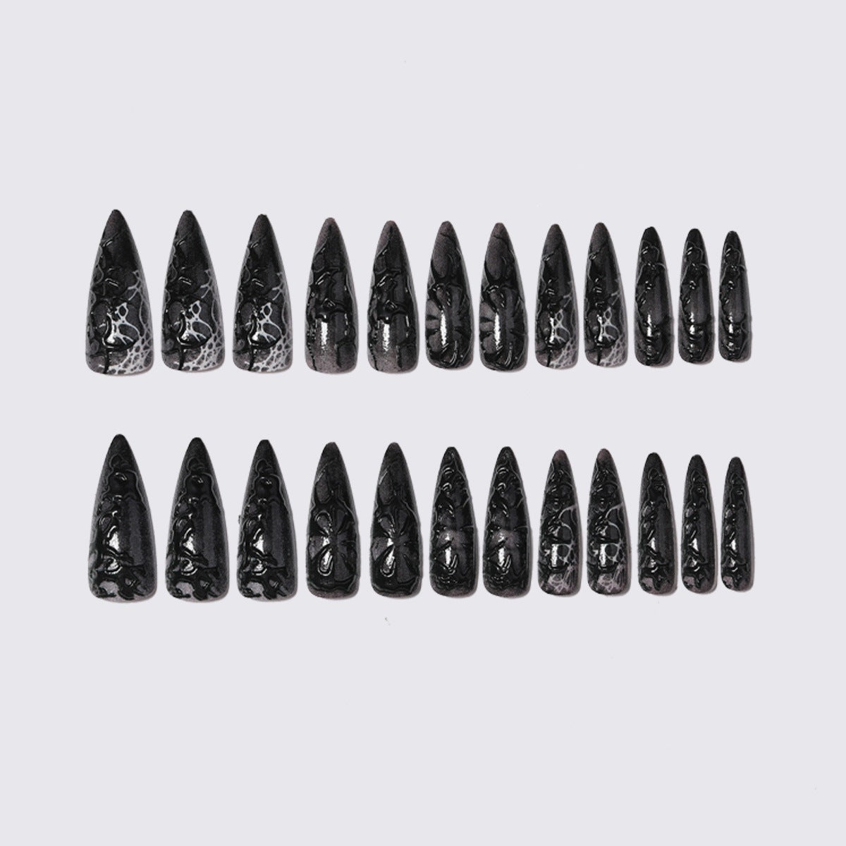 Kreatives Kunstnagelset im Spinnen-Muster Brehn