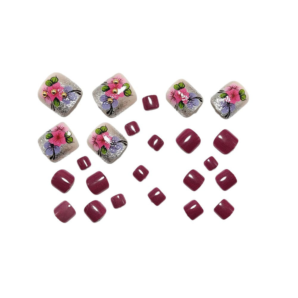 Kunstnägel mit Floralen Designs und Glitzereffekten Brehn