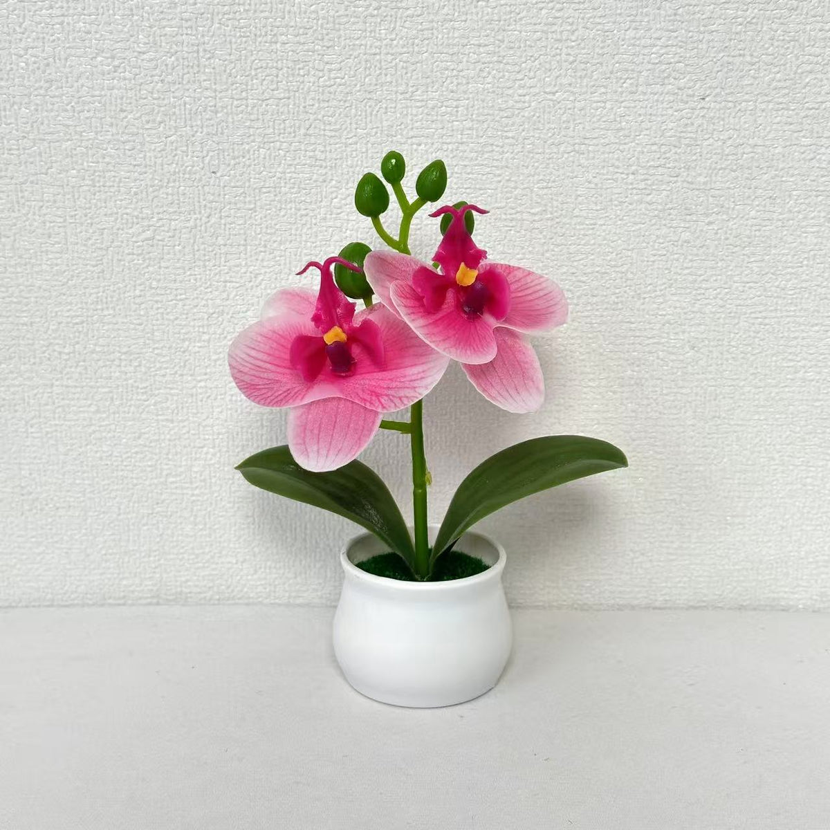Elegante künstliche Orchideen Dekoration