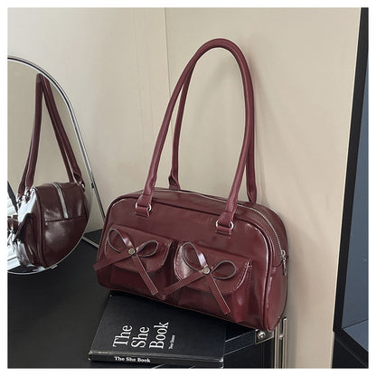 Stilvolle multifunktionale Handtasche mit Schleifendetail Brehn