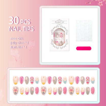 Künstlerisches Press-On-Nagelset mit floralen und Muschel-Designs