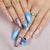Elegantes Kunstnagelset mit zarten Ombre-Effekten und funkelnden Details Brehn