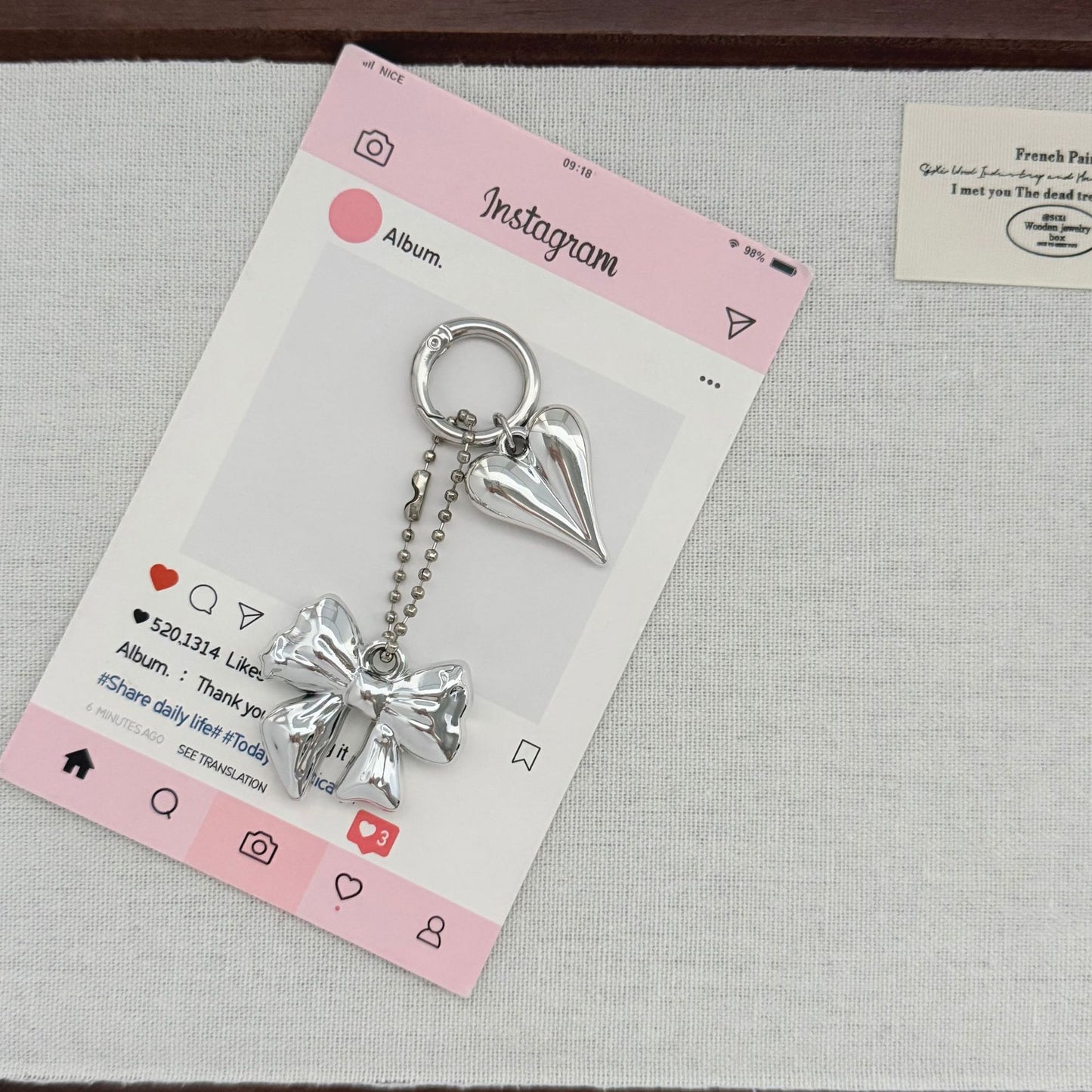 Herzförmiger Charm-Schlüsselanhänger mit Schleife Brehn