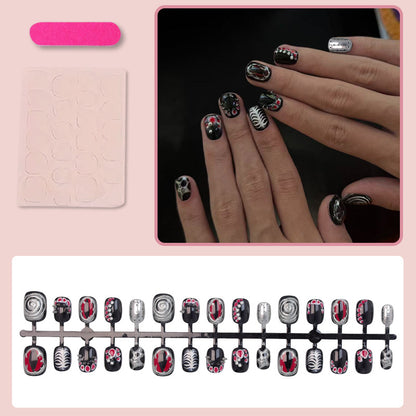 Kunstnagelset mit kreativen Mustern und glamourösen Details Brehn