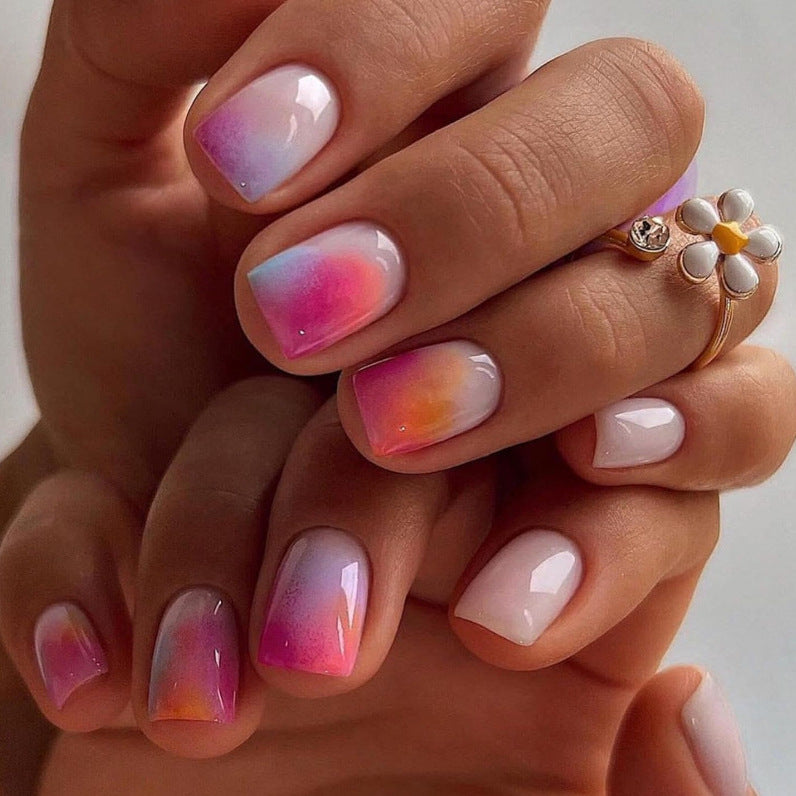 Kunstnagelset mit elegantem Farbverlauf und glitzernden Akzenten Brehn