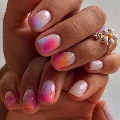 Kunstnagelset mit elegantem Farbverlauf und glitzernden Akzenten Brehn