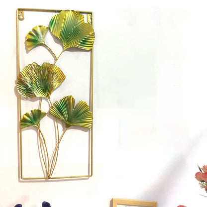 Dekorative Metallwandkunst mit tropischem Blatt- und Spiegeldesign Brehn