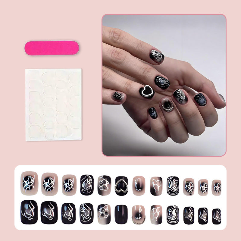 Kunstnagelset mit kreativen Schwarz-Weiß-Mustern Brehn