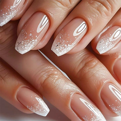 Kunstvolle Nagelverlängerungen mit Glitzer und Ombre-Effekt Brehn