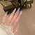 Blumen-inspiriertes Stiletto Press-On Nageldesign Brehn