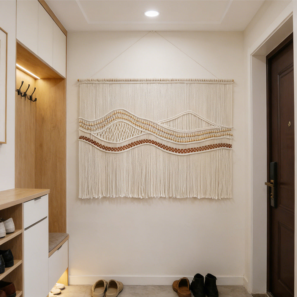 Künstlerische Makramé-Wandbehang mit eleganten Wellenmustern
