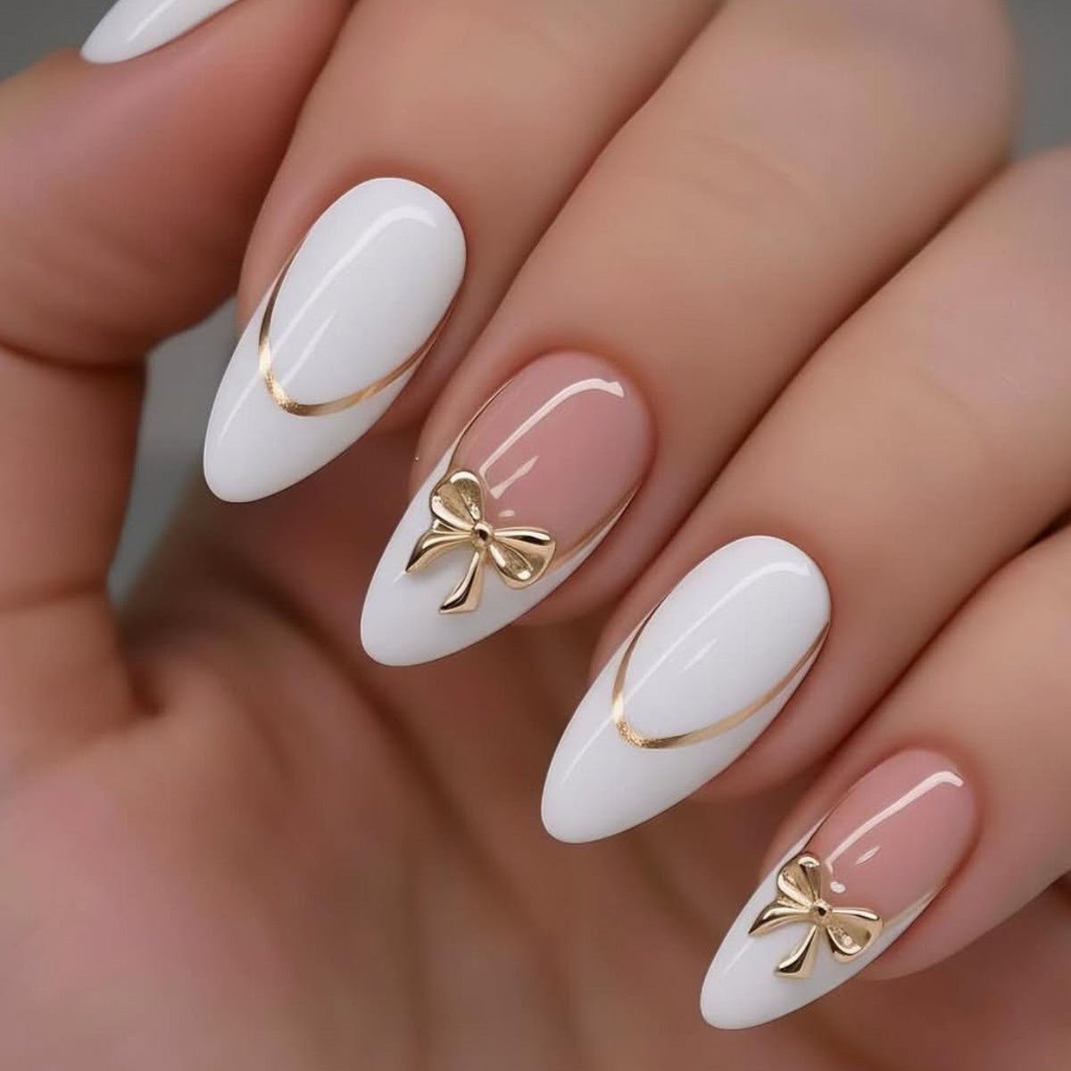 Elegante Stiletto-Nagelverlängerungen mit dekorativen Schleifenakzenten Brehn