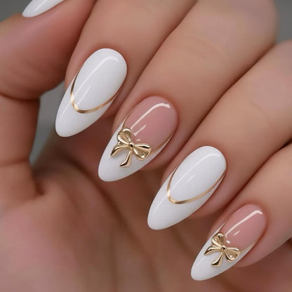 Elegante Stiletto-Nagelverlängerungen mit dekorativen Schleifenakzenten Brehn