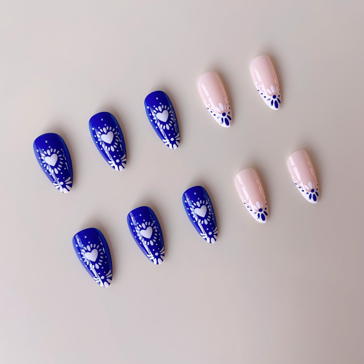 Kunstnagelset mit kreativen Blumen- und Herzmotiven Brehn