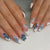 Kreatives Kunstnagelset mit aufwendigen Blumen-Designs Brehn