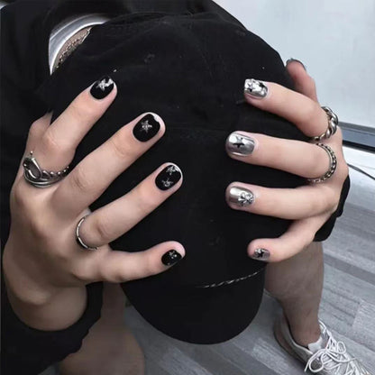 Kunstnagelset mit elegantem Design und gleitenden Dekoren Brehn