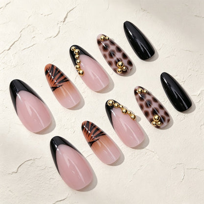 Kunstnagelset mit eleganten Tier- und Glitzermustern Brehn
