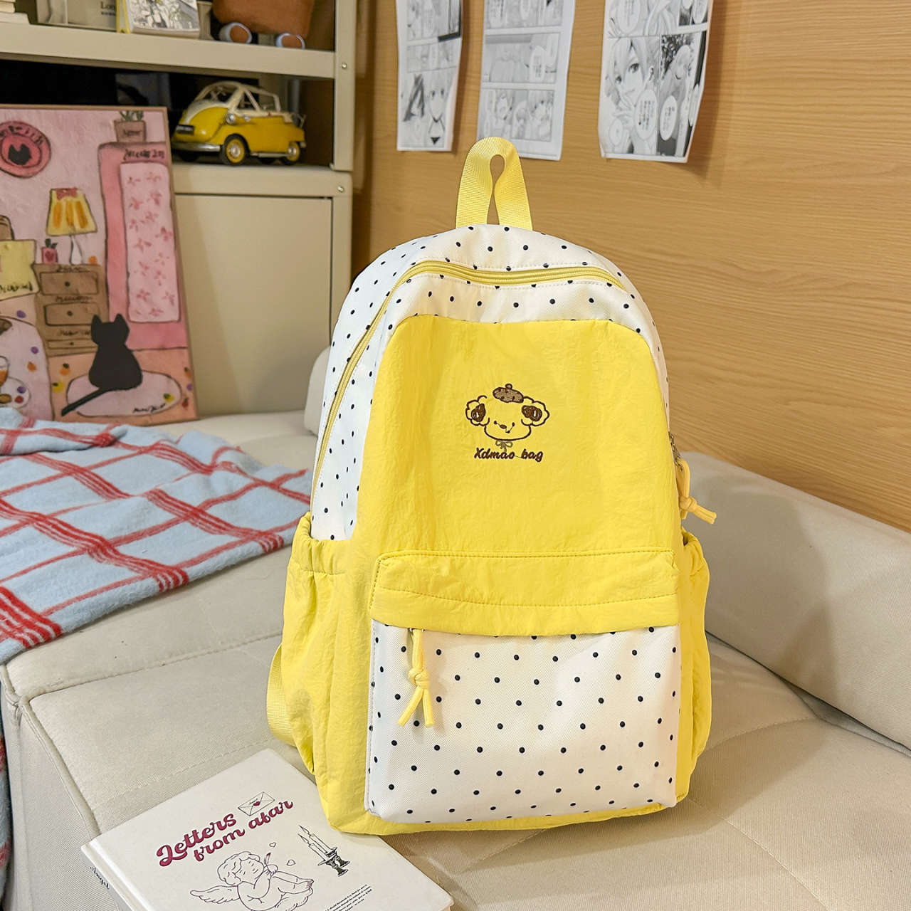 Spielerischer gepunkteter Rucksack Brehn