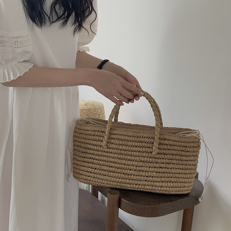Damen Handtasche aus geflochtenem Naturmaterial Brehn