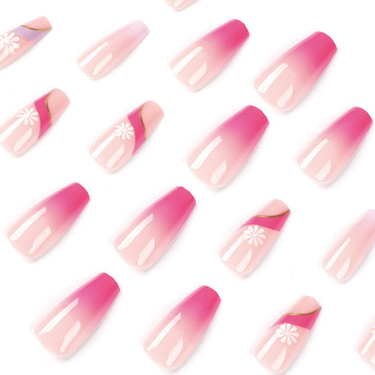 Kunstvolle Nagelverlängerungen mit buntem Ombre-Design und floralen Akzenten Brehn