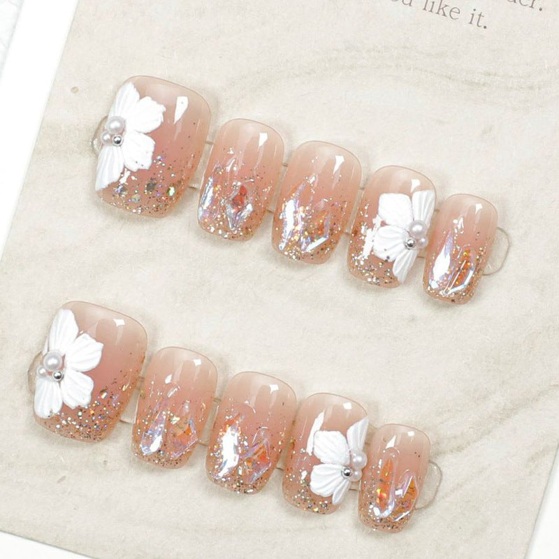 Künstlerisch florales, verziertes Press-On Nageldesign Brehn