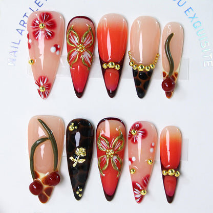 Kunstnagelset mit eleganten Blumendekoren und modernen Akzenten Brehn