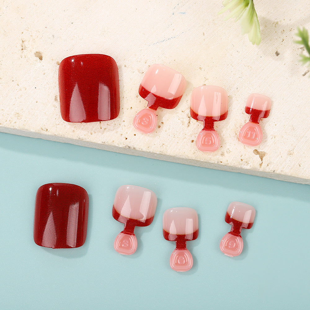 Kunstnagelset im eleganten Rot- und Nude-Design Brehn