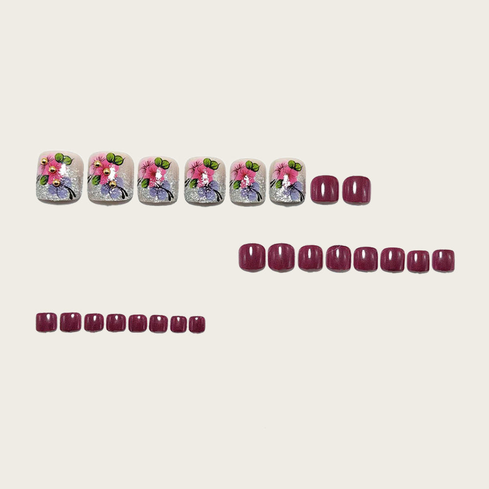 Kunstnägel mit Floralen Designs und Glitzereffekten Brehn