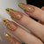 Elegante goldakzentierte Press-On-Nagelkunst Brehn