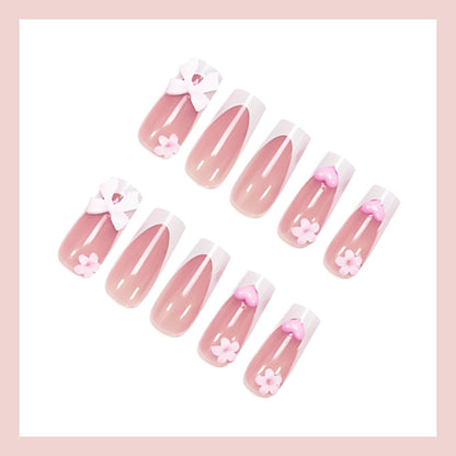 Kunstnagelset mit romantischen Blüten und eleganten Akzenten Brehn