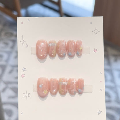 Kunstnägel mit Romantischen Sternen- und Glitzermotiven Brehn
