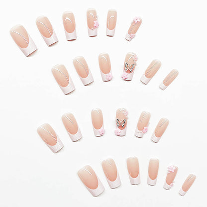 Kunstnagelset mit verspielten 3D-Blüten und Glitzerakzenten Brehn