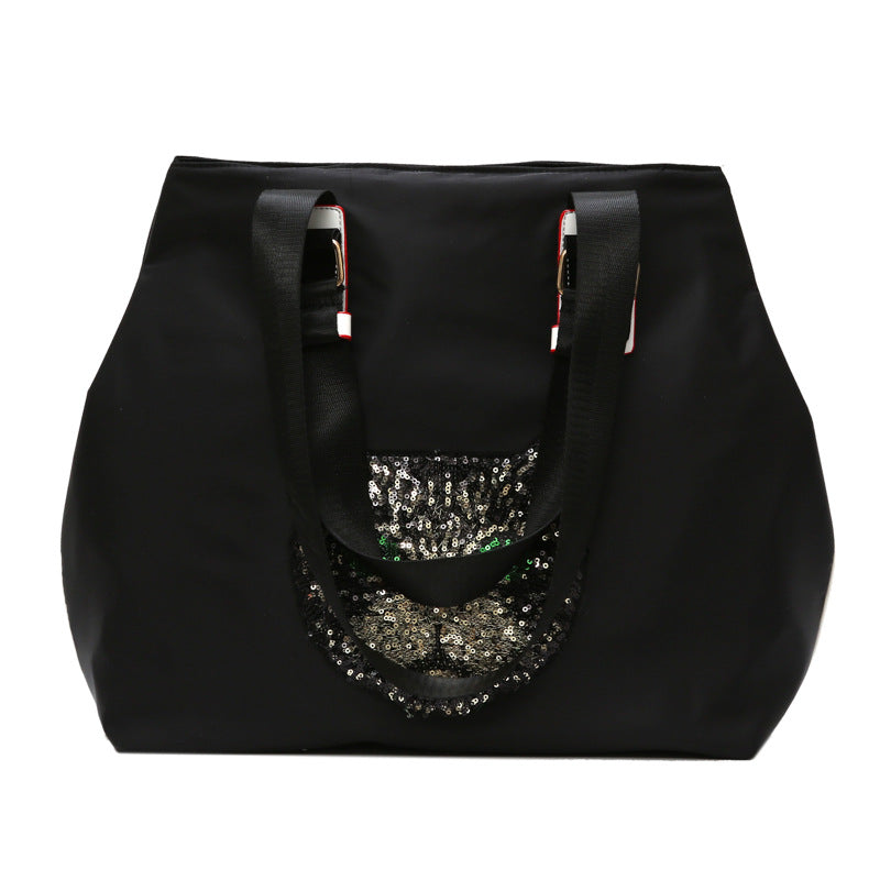 Stylische mit Pailletten dekorierte Tragetasche