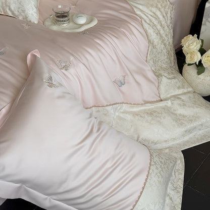 Luxuriöses Baumwollsatin-Bettwäscheset mit Schmetterlingsstickerei und Bindeband-Kissen