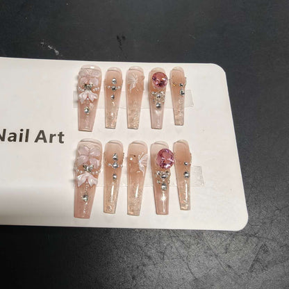 Dekoratives Press-On Nagelkunst-Set mit eleganten Blumen- und Strass-Akzenten