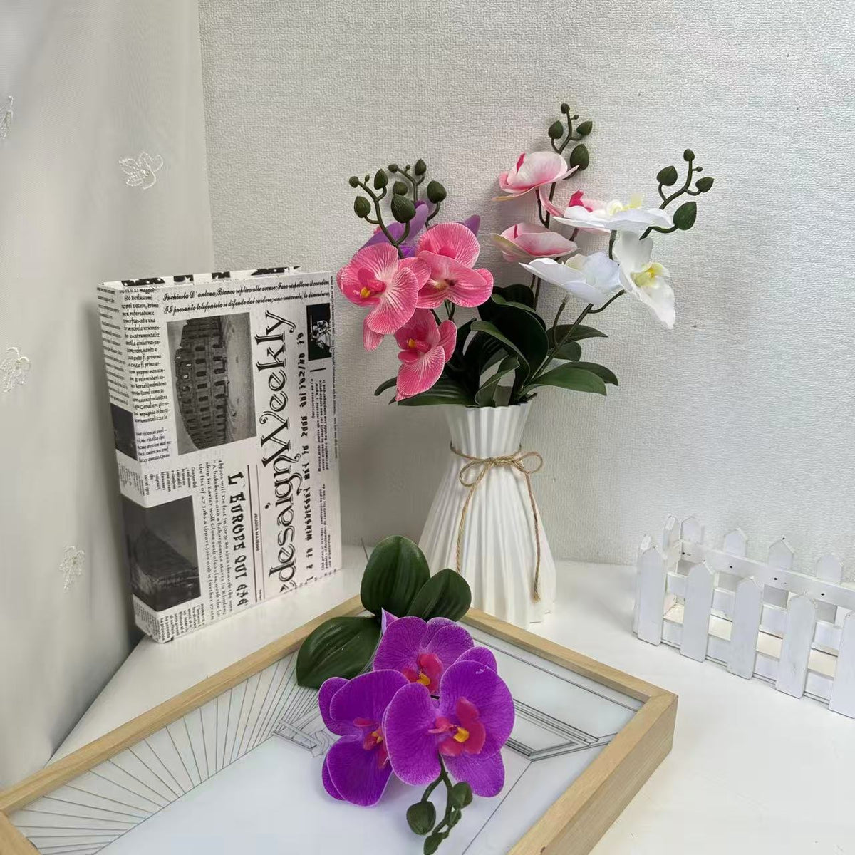 Künstliches Orchideenblütenarrangement für dekorative Wohnraumausstellung