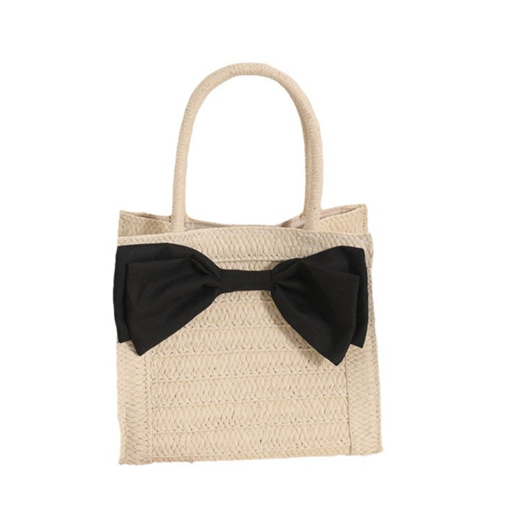 Elegante Basttasche mit Schleifendetail Brehn