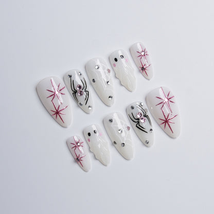 Kunstvolles Nagelset mit Edelstahl-Applikationen Brehn