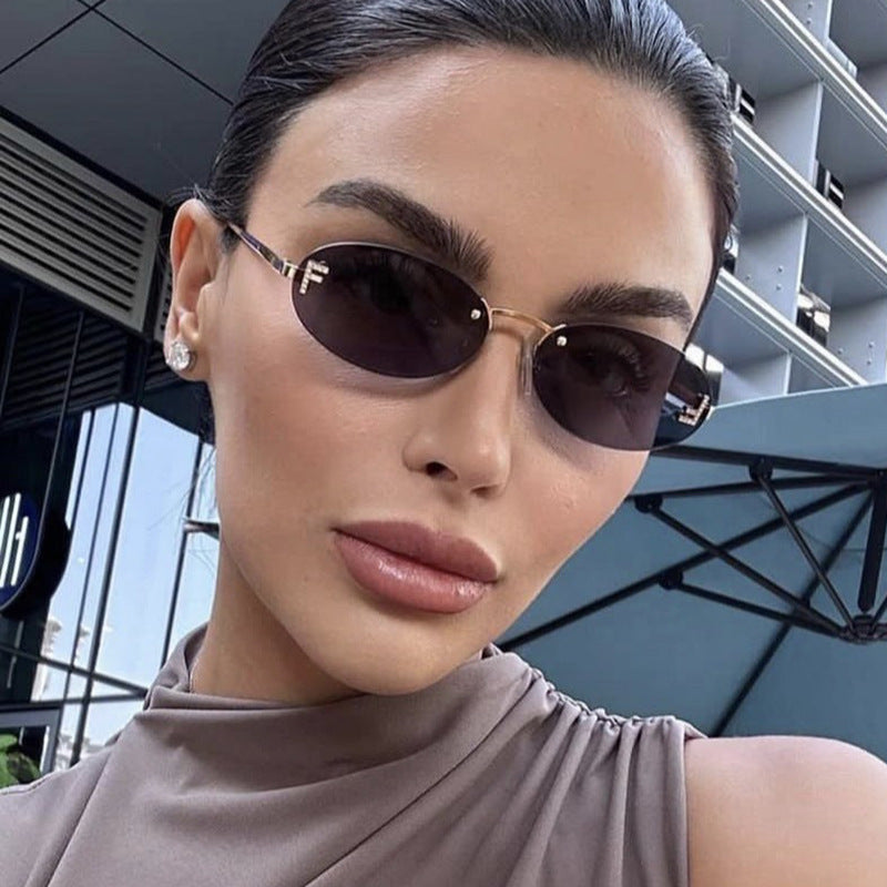 Damen modische Sonnenbrille mit eleganten, runden Gläsern und filigranem Metallrahmen Brehn
