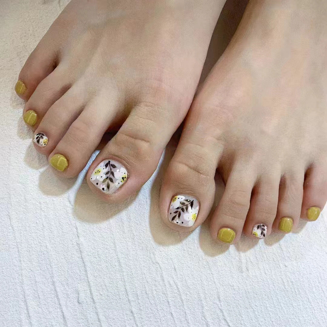 Künstlerische florale Pediküre Nagelkunst