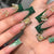 Kunstnagelset mit luxuriösen Verzierungen und kreativen Designs Brehn