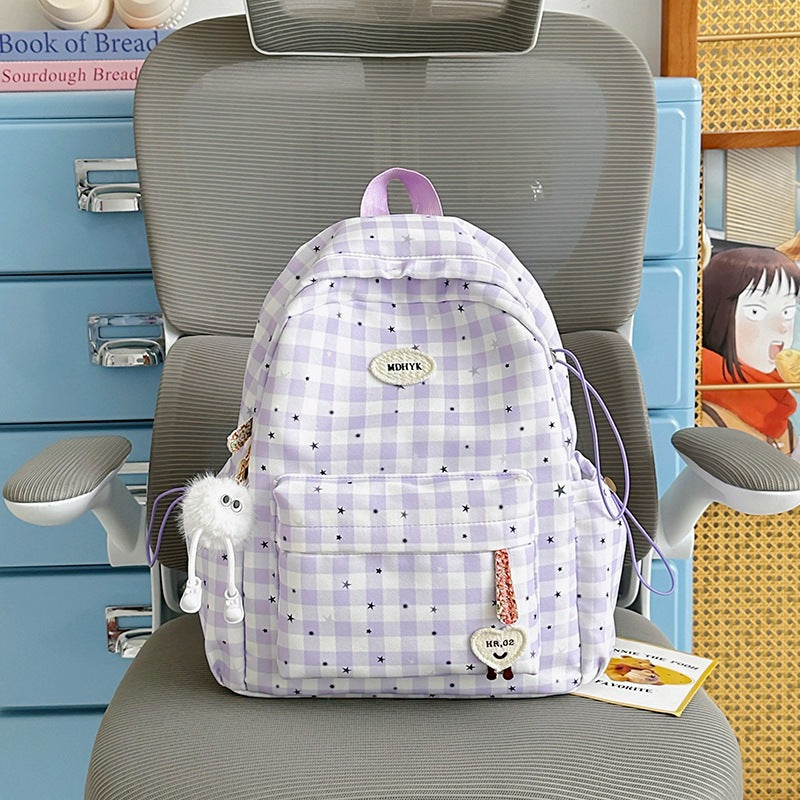 Süßer gemusterter Schulrucksack