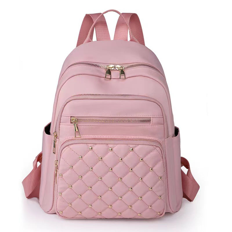 Quilted Rucksack mit dekorativen Nieten Brehn