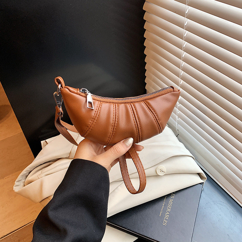 Texturiertes Mini Crossbody Täschchen Brehn
