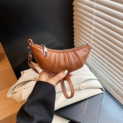 Texturiertes Mini Crossbody Täschchen Brehn