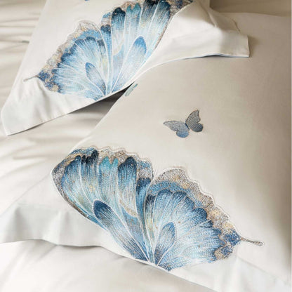 Gestickte Baumwollsatin-Bettbezuggarnitur mit blauem Schmetterlingsmotiv