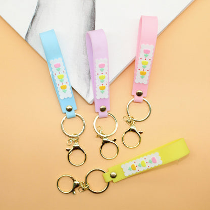 Unisex Schlüsselanhänger aus strapazierfähigem Silikon mit verspieltem Design Brehn