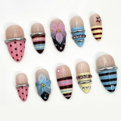 Kunstnagelset mit kreativen und verspielten Motiven Brehn